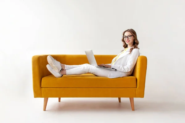 Young Businesswoman Suit Uses Laptop Comfortable Soft Sofa Girl Formal — Stock Photo, Image