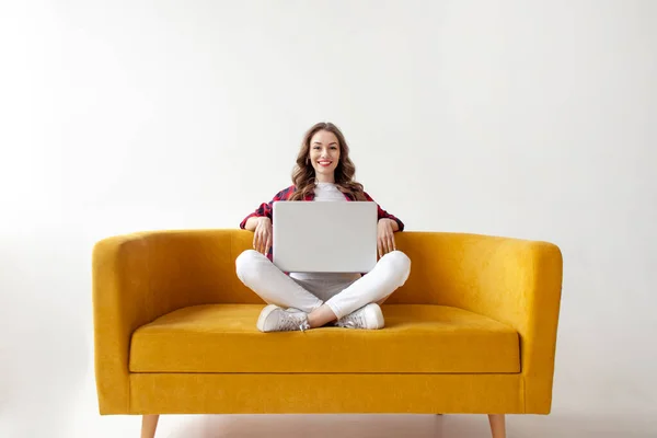 Young Cute Girl Uses Laptop Comfortable Soft Sofa Woman Types — Stock Photo, Image