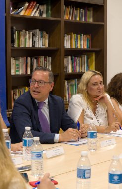 MADRID - SPAIN - JUL 10th 2024 - Alfonso Serrano, Secretary General of the PP of Madrid and Almudena Negro, Mayoress of Torrelodones during a press conference clipart