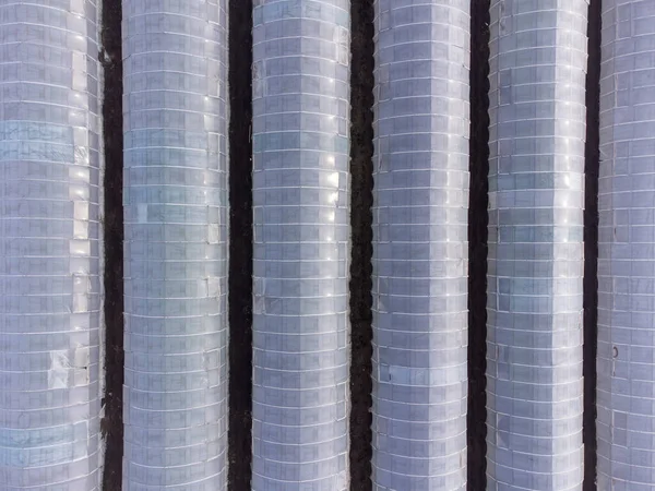 Üvegházak Sorakoznak Sorban Átlátszó Műanyag Fólia Antenna Felülnézetben — Stock Fotó