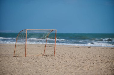 Beach soccer goal . Sandy beach with football gate no people