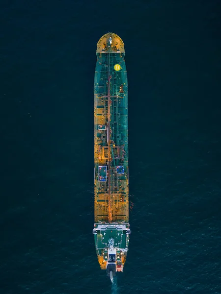 Aerial top view oil ship tanker carrier oil on the sea at sunset