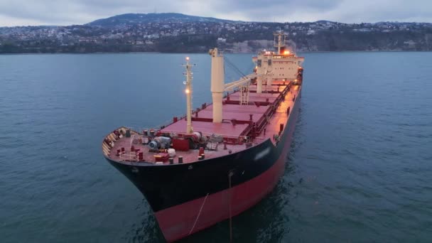 Aerial View Bulk Carrier Evening Showcases Stunning Display Lights Reflecting — Stock Video