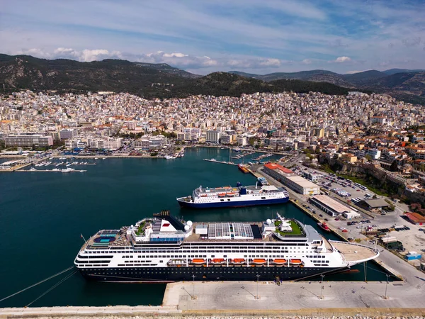 stock image Aerial view cruise ship in port of Kavala. Kavala is a picturesque city located in northeastern Greece, known for its stunning aerial views. Visitors can enjoy breathtaking panoramas of the citys