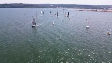 Aerial top view of sailing yachts regatta race on sea near Varna in Bulgaria, Black sea