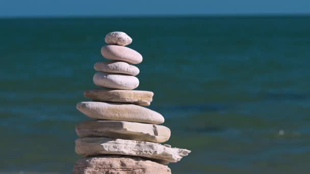 Pyramid Stacked Stones Sea Symbolizes Balance Harmony Nature Creating Majestic — Stock Video