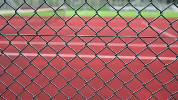 Chain Link Fence Blurred Tennis Court Beckons Enticing Players Game — Stock Video