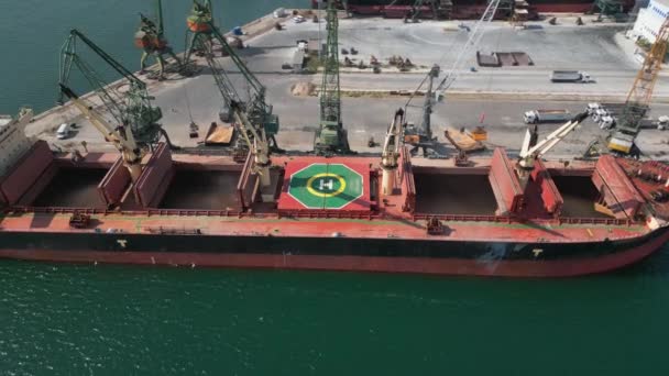 Aerial Top View Bustling Seaport Massive Cargo Ship Bulk Carrier — Stock Video