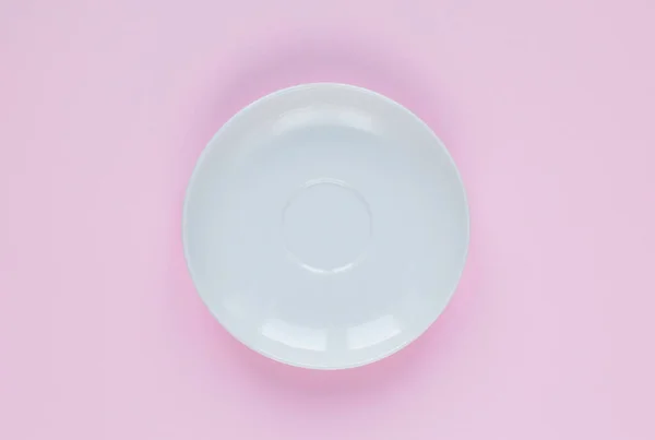 stock image White plate, flat lay. Empty plate on pink background