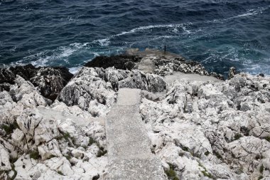 Deniz ve kayalar. Deniz arka planı, Hvar Adası, Hırvatistan