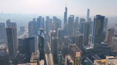 Palm Adaları 'nın havadan görünüşü üç yapay adadan oluşur: Palm Jumeirah, Deira Adaları ve Dubai kıyılarındaki Palm Jebel Ali..