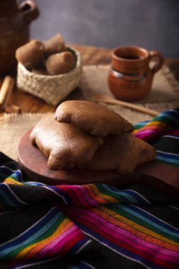 Puerquitos de Piloncillo. Also called Cochinitos, Cerditos or Chichimbres. Traditional Mexican sweet bread with pig shape, usually eaten with pot coffee or hot chocolate. clipart