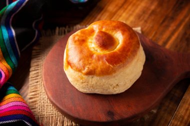 Bisquet. Also known as Bisquets Chinos, it is one of the traditional breads in Mexico, commonly consumed hot, cut in half and spread with butter and fruit jam.
