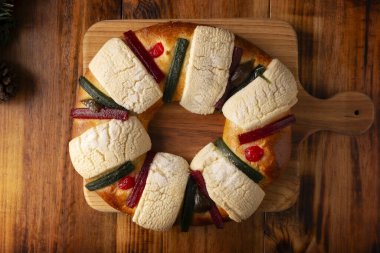 Three Kings Bread also called Rosca de Reyes, Roscon, Epiphany Cake, traditionally served with hot chocolate in a clay Jarrito. Mexican tradition on January 5th. clipart