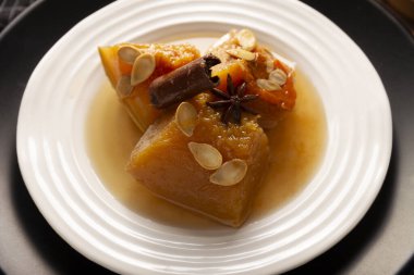 Calabaza en Tacha. Spiced Candied Pumpkin. Mexican dessert whose main ingredients are pumpkin and piloncillo, also known as Chacualole or Calabaza en dulce, widely used in Day of the Dead offerings. clipart