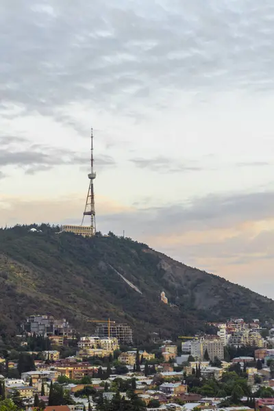 stock image Tbilisi TV tower, Funicular, Mtatsminda, Mama Daviti Church, mountains. Old town district