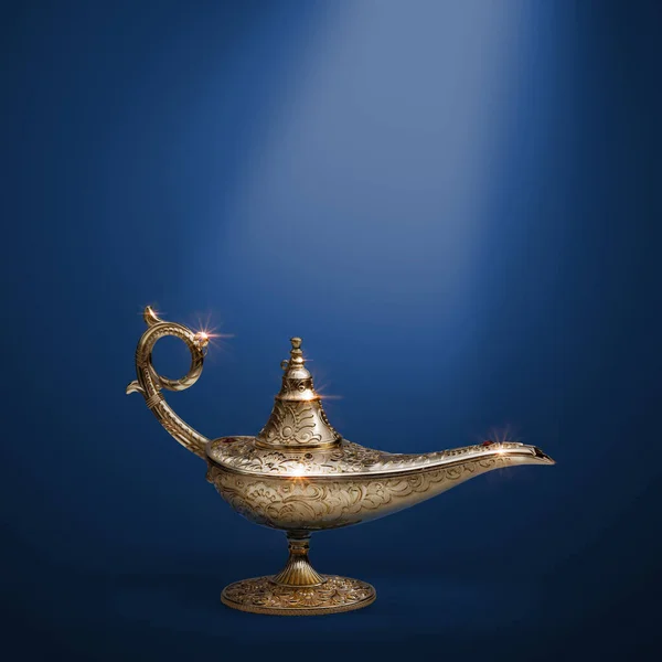 Precious golden magic lamp on blue background, fairy tales and wish fulfillment concept