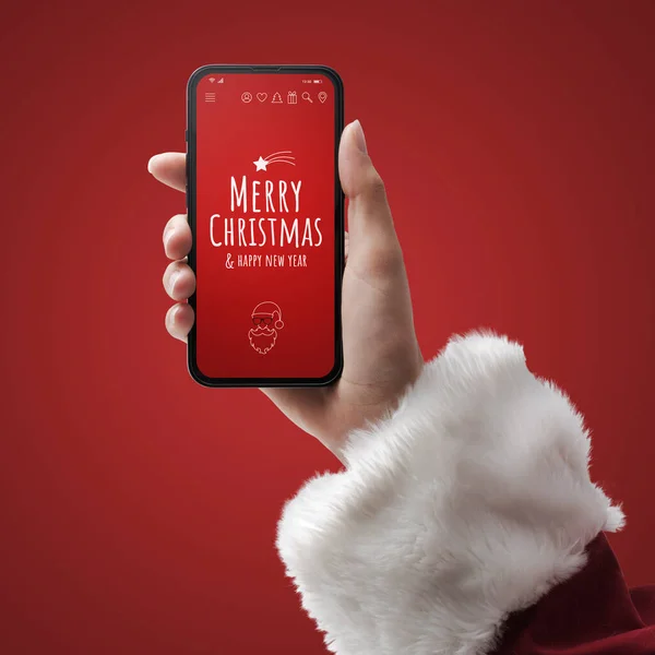 Papai Noel Segurando Smartphone Com Desejos Natal Espaço Branco Cópia — Fotografia de Stock