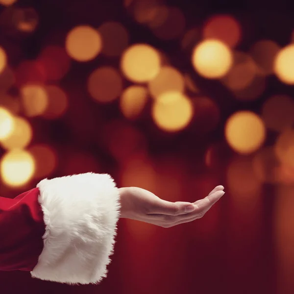 Santa Claus Palm Hand Bokeh Christmas Lights Background Charity Giving — Stock Photo, Image