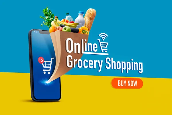 Online grocery app on smartphone and full grocery bag coming out of the smartphone screen, online grocery shopping concept