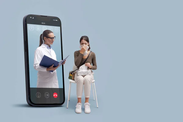 Online doctor taking care of a patient with cold and flu on video call, telemedicine concept