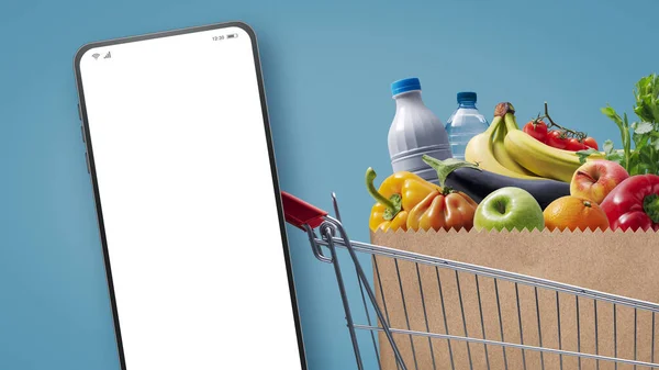 Carrello Della Spesa Del Supermercato Pieno Generi Alimentari Smartphone Con — Foto Stock