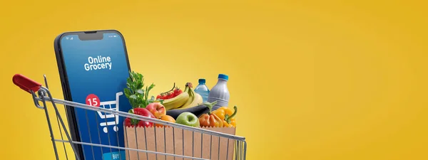 Carrito Compras Del Supermercado Lleno Comestibles Teléfonos Inteligentes Con Aplicación —  Fotos de Stock