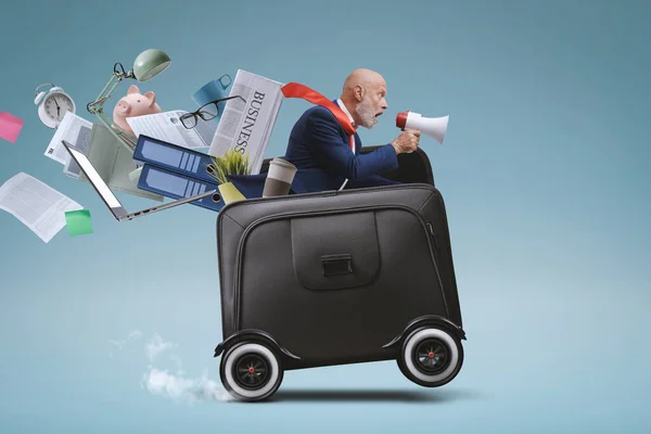 Businessman Megaphone Riding Briefcase Wheels Shouting – stockfoto