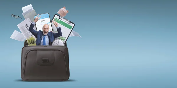 Cheerful Businessman Celebrating Arms Raised Office Items Briefcase Successful Business — Zdjęcie stockowe