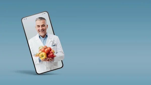 Professional Smiling Nutritionist Holding Fresh Vegetables Fruit Smartphone Videocall Smiling — Stock Photo, Image
