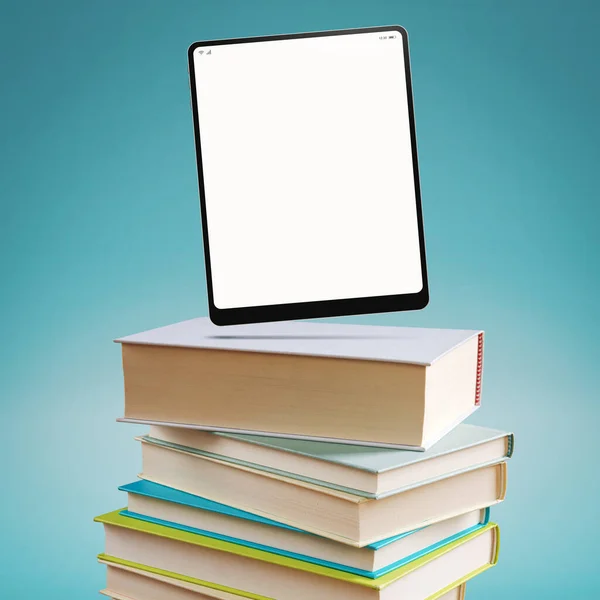 Digital tablet with blank screen on a pile of books: learning and e-book concept