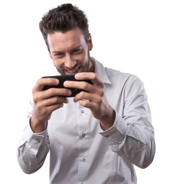 Yakışıklı Bir Genç Adam Onun Smartphone Ile Oynamak — Stok fotoğraf