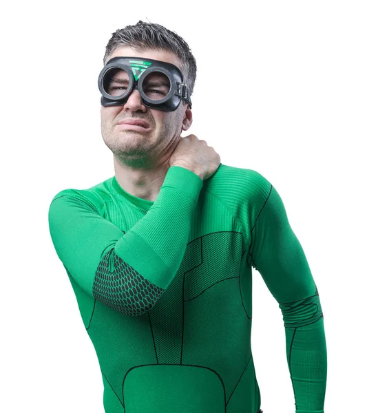 Green Superhero Touching His Neck Shoulder Feeling Pain — Stock Photo, Image