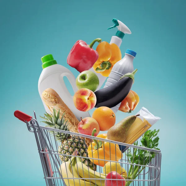 Fresh Groceries Goods Falling Supermarket Trolley Grocery Shopping Concept — Zdjęcie stockowe