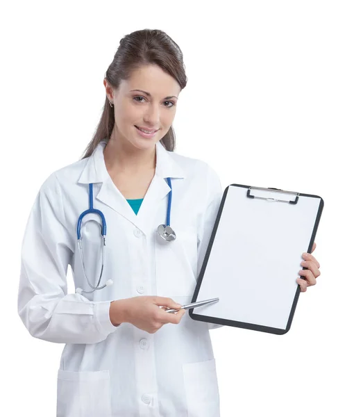 Confident Woman Doctor Pointing Clipboard — Stock Photo, Image