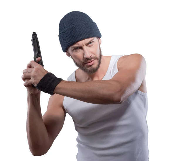 銃を保持してキャップを持つハンサムな積極的な刑事 — ストック写真