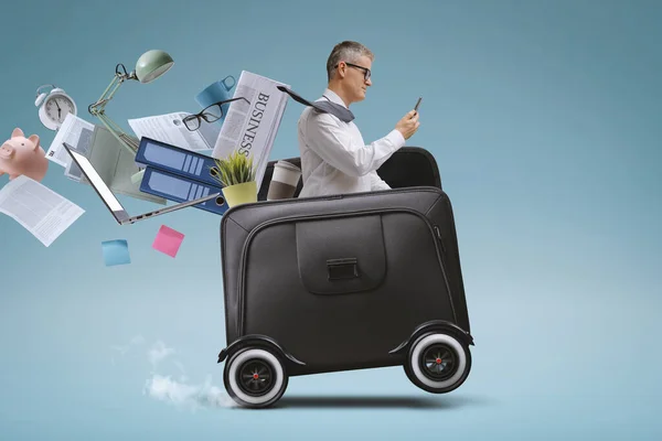 Businessman Riding Fast Briefcase Wheels Using Smartphone Mobility Concept — Foto de Stock
