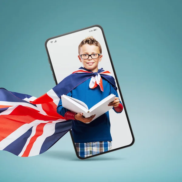 Cute Superhero Boy Reading Book Smartphone Videocall Smiling Online Education — Stock Fotó