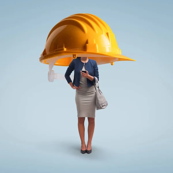 Big Safety Helmet Protecting Woman Using Smartphone Data Protection Security — Stock Photo, Image