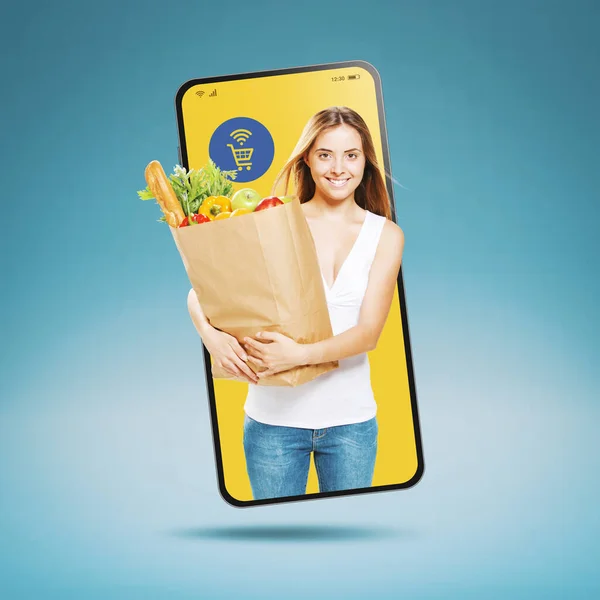 Online grocery shopping app: happy customer holding a full shopping bag and smiling