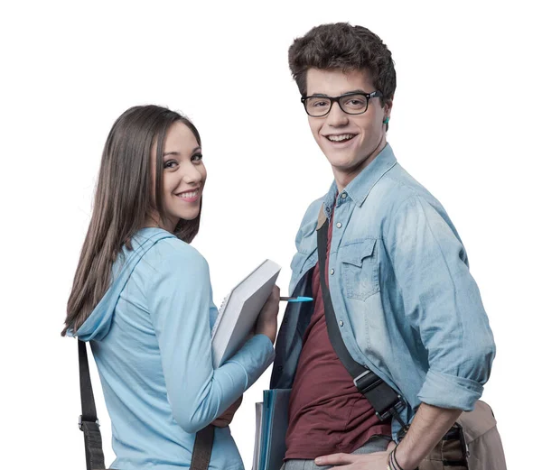 stock image Cheerful smiling students with textbooks hanging out together