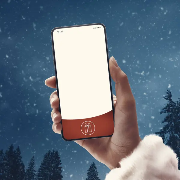 バックグラウンド クリスマス テクノロジーコンセプトで空白の画面とワインの風景を持つスマートフォンを保持する女性サンタクロース — ストック写真