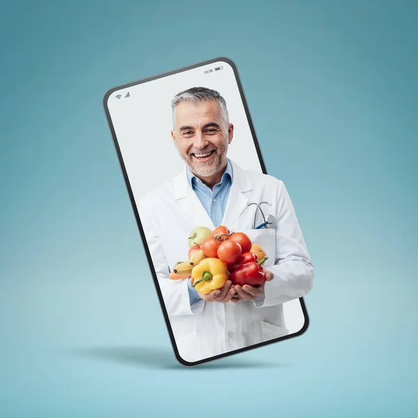 Professional Smiling Nutritionist Holding Fresh Vegetables Fruit Smartphone Videocall Smiling — Foto Stock