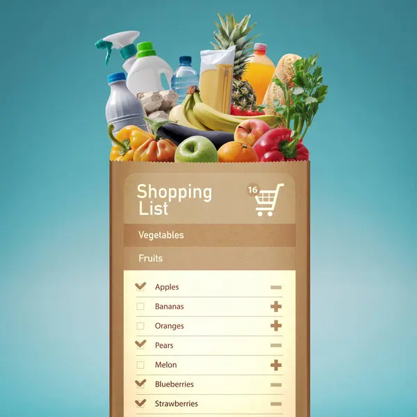 Digital shopping list on a full grocery bag with fresh items, online grocery shopping and home delivery concept
