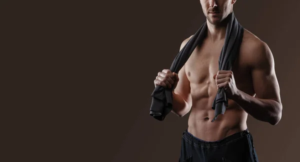 Handsome Athletic Man Showing His Muscular Body Holding Towel — Stock Photo, Image