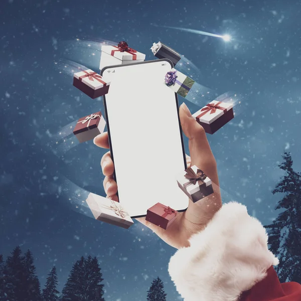 Santa Claus Sostiene Teléfono Inteligente Con Pantalla Blanco Rodeado Regalos —  Fotos de Stock