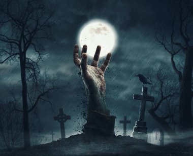 Mezardan yükselen zombi: Yerden çıkan ürkütücü eller ve eski mezar taşları