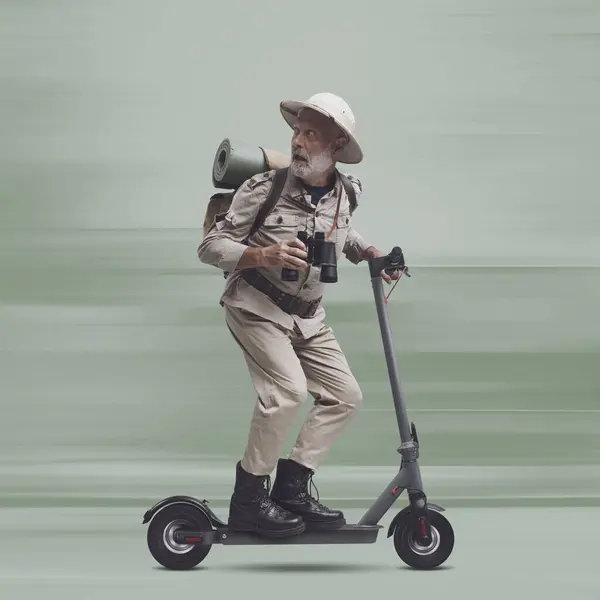 Funny Scared Explorer Being Chased Monster Riding Electric Scooter Running — Stock Photo, Image