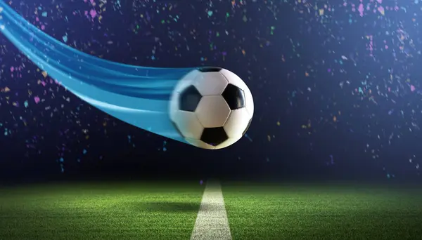 Fast soccer ball flying at the stadium at night and confetti falling, soccer championship and celebration concept