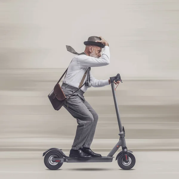 Vintage Style Traveler Holding Suitcase Riding Electric Scooter — Stock Photo, Image